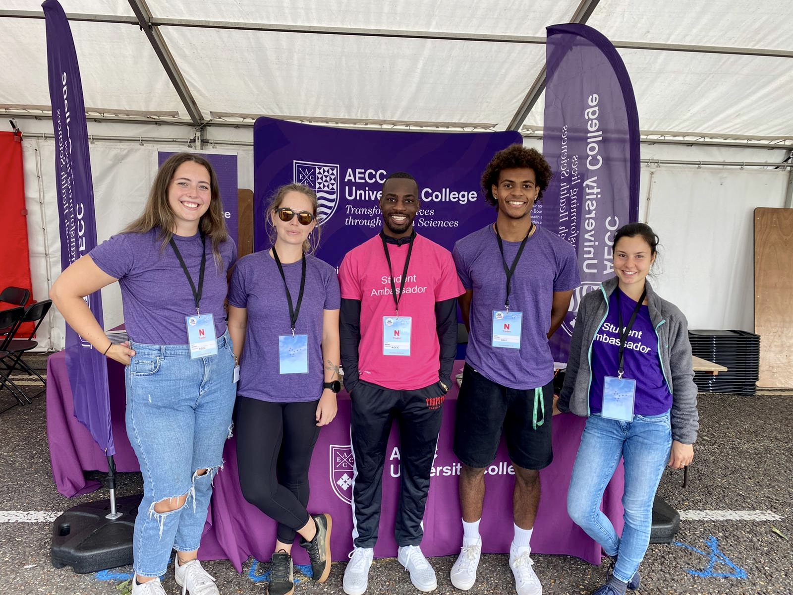 Student Ambassadors at the Bournemouth Air Show event by a table