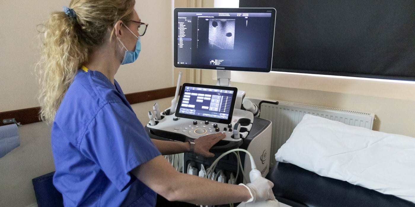 Megan Hawthorn using a machine to image a mannequin