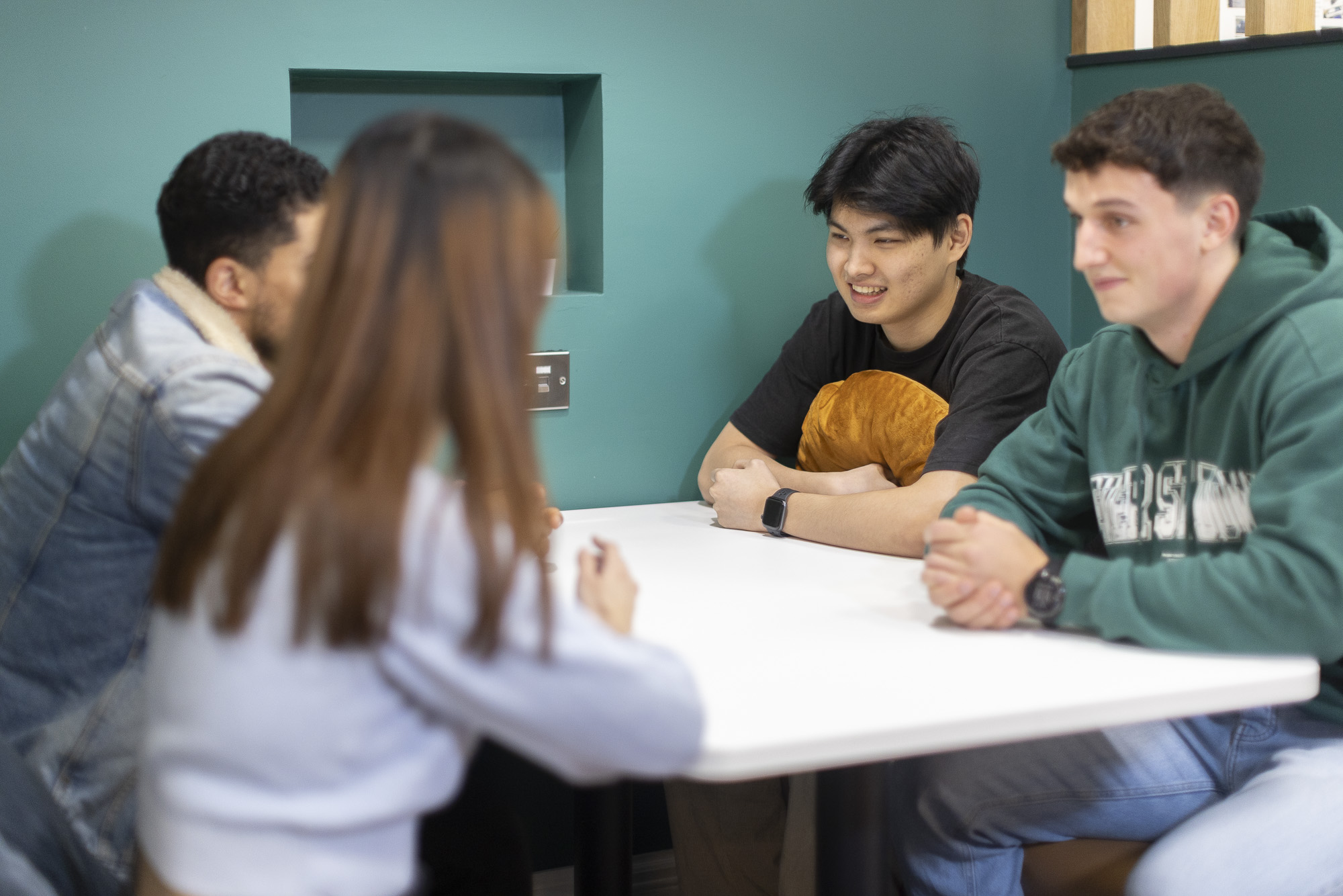 students sitting around a table